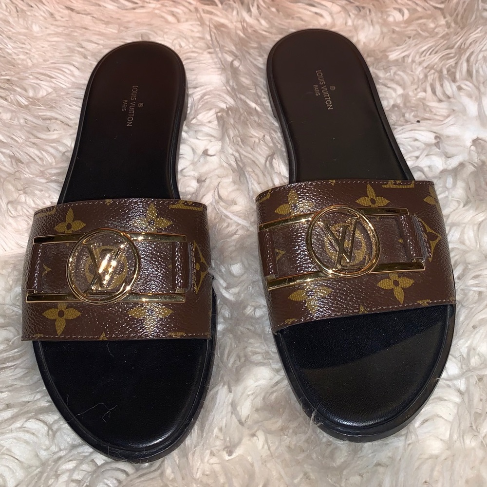 Authentic Louis Vuitton “Lock-It” Mule Flats